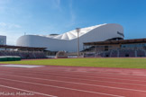 <center>Le stade Vélodrome vu du stade Delort.</center>Le stade Delort. Restructuré en 2015, une piste d’athlétisme entoure le carré de pelouse naturelle. Il s’agit d’ailleurs du seul stade de Marseille où on peut accueillir des compétitions d’athlétisme d’envergure nationale et internationale.